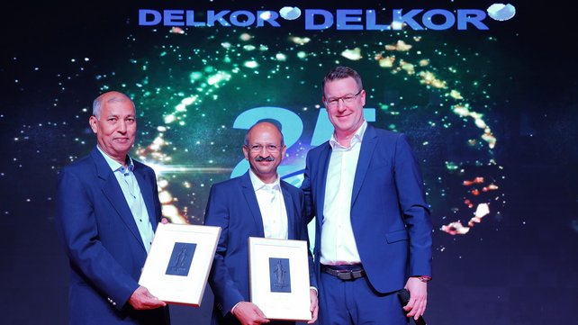 The picture shows From left to right: Indu Bhushan Jha (retiring Managing Director of DELKOR India), Rajiv Krishnamurthy (new Managing Director of DELKOR India) and Thomas Jabs (TAKRAF Group CEO) at a recent event celebrating the 25th anniversary of DELKOR India.