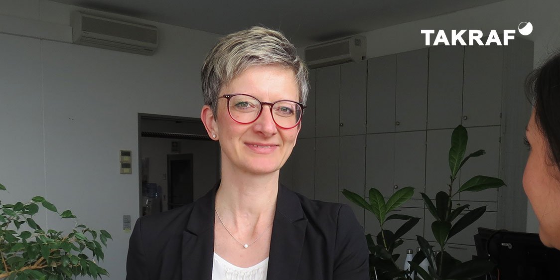 Portrait of Ina Planert in an office