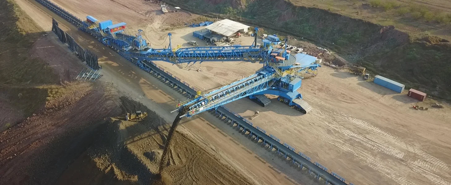 Erection of a spreader with a tripper car, Thailand. The erection of a TAKRAF Spreader with a TAKRAF tripper car in Thailand.