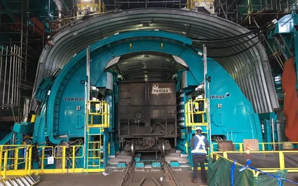 Wagon unloading station with tandem O-type tippler