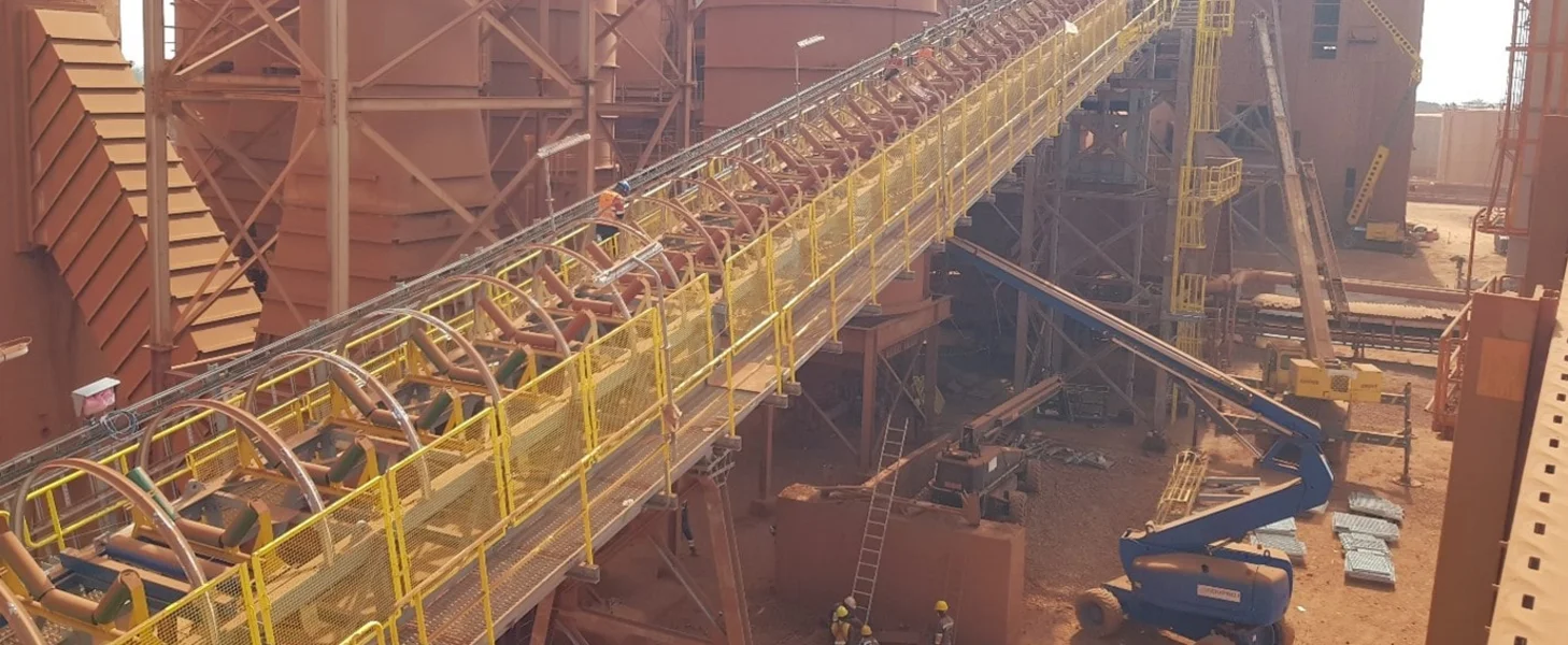 Conveyor replacement at a brownfield project in Guinea. A conveyor being replaced at a brownfield project in Guinea.