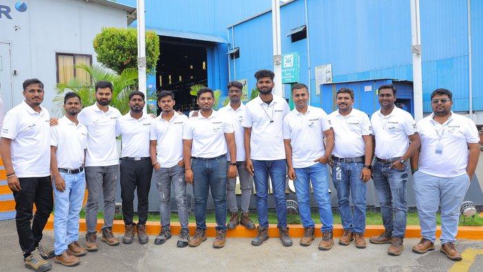 The DELKOR India team members at the 2 million man-hours of zero harm event in front of the DELKOR India Product Centre in Bengaluru, India.