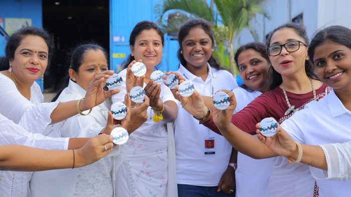 The DELKOR India team members with their 2 million man-hours of zero harm badges.