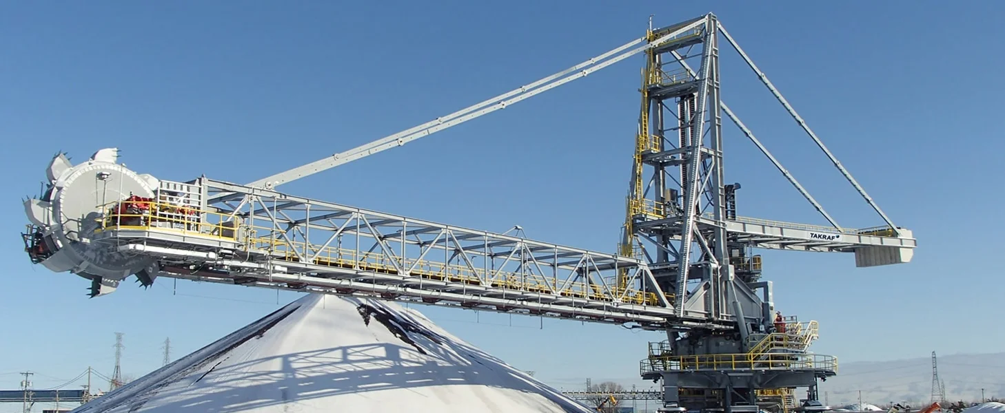TAKRAF Stacker Reclaimer for iron ore pellets, North America. TAKRAF Stacker Reclaimer for iron ore pellets, North America.