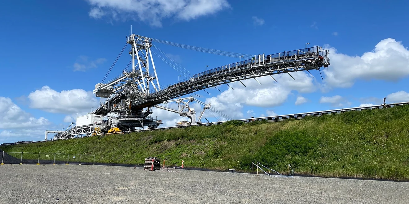 TAKRAF 6,300 t/h Rail-Mounted Stacker for a bulk terminal, Australia. TAKRAF 6,300 t/h Rail-Mounted Stacker for a bulk terminal, Australia.