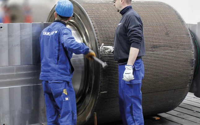 Arbeiten an einer Rollenpresse