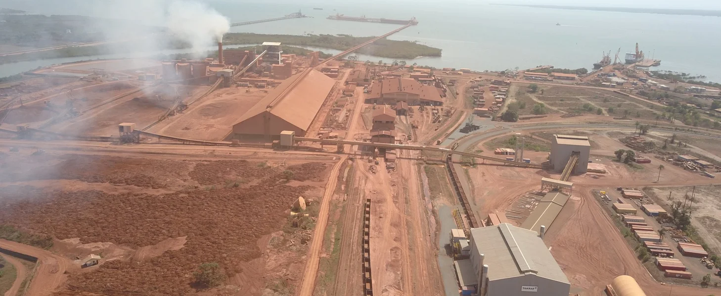 Railcar unloading, crushing and conveying sytsem, Guinea. A railcar unloading and crushing and conveying system in Guinea.