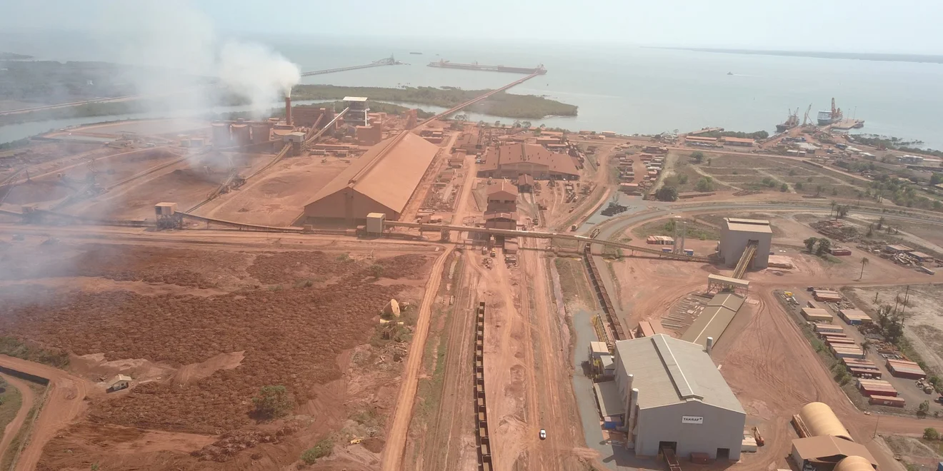 Railcar unloading, crushing and conveying sytsem, Guinea. A railcar unloading and crushing and conveying system in Guinea.