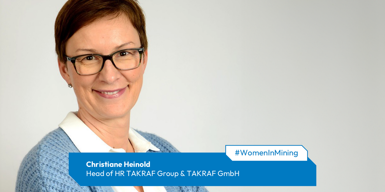 Christiane Heinold, Head of HR TAKRAF Group & TAKRAF GmbH The picture shows a woman friendly looking in the camera with arms crossed.
